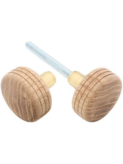 Pair of Box Style Unfinished-Wood Doorknobs with Solid Brass Base in Polished Brass.